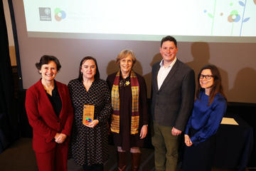 Research Services VC Professional Services Awards Research Services team accepting Registrar's Choice Award
